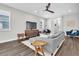 Bright living room with modern furniture, sleek floors, and stylish accents at 3975 Night Star Trl, Odessa, FL 33556