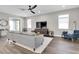 Modern living room with sleek furnishings, ample natural light, and contemporary decor at 3975 Night Star Trl, Odessa, FL 33556