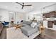 Open-concept living room flowing into the kitchen, perfect for modern living at 3975 Night Star Trl, Odessa, FL 33556
