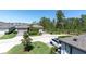 Overview of a lovely neighborhood street with well-kept lawns and stylish homes at 3975 Night Star Trl, Odessa, FL 33556