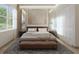 Inviting bedroom with a plush rug, a warm color palette, a bench, and a large window at 4611 Hickory Oak Dr, Brooksville, FL 34601