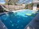 Outdoor pool with a slide; plenty of room for recreation at 5227 Kirkwood Ave, Spring Hill, FL 34608