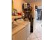 Bright laundry room with washer, dryer, shelves, and storage space at 5249 Courtland Rd, Spring Hill, FL 34608