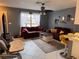 Inviting living room bathed in natural light with comfortable seating and stylish decor at 5249 Courtland Rd, Spring Hill, FL 34608