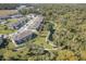 Community with pond and walking path offering a picturesque community and enhanced living experience at 5360 Riverwalk Preserve Dr, New Port Richey, FL 34653