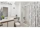 Bathroom with neutral-toned shower curtain and vanity at 5557 Sea Forest Dr # 318, New Port Richey, FL 34652
