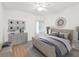 Inviting bedroom with a neutral palette, decorative wall art, and hardwood floors at 5557 Sea Forest Dr # 318, New Port Richey, FL 34652