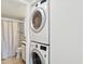 Convenient in-unit laundry closet adjacent to the bathroom at 5557 Sea Forest Dr # 318, New Port Richey, FL 34652