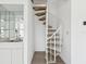 An open-concept design featuring a spiral staircase and a wet bar at 5557 Sea Forest Dr # 318, New Port Richey, FL 34652