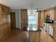 Kitchen with island, granite countertops, stainless appliances, and stained glass window at 5956 Seaside Dr, New Port Richey, FL 34652