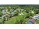 Stunning aerial view of a golf course community with lush greenery and well-maintained homes at 6652 Brambleleaf Dr, Spring Hill, FL 34606