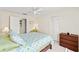 Tranquil bedroom offering a peaceful retreat with ample natural light and closet space at 6652 Brambleleaf Dr, Spring Hill, FL 34606