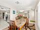 Open-concept dining area flows seamlessly into the living room and kitchen, great for entertaining at 6652 Brambleleaf Dr, Spring Hill, FL 34606