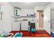 Practical laundry room equipped with a washer, dryer, and utility sink at 6652 Brambleleaf Dr, Spring Hill, FL 34606