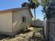 Exterior view of the house showcasing the attached addition at 7167 Landmark Dr, Spring Hill, FL 34606