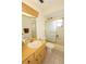 Clean and functional bathroom with tub-shower combination and vanity sink at 8121 Casuarina Dr, Port Richey, FL 34668