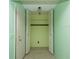 Entryway features neutral walls, closet, and tile flooring at 8121 Casuarina Dr, Port Richey, FL 34668