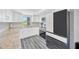 Well-lit kitchen featuring granite countertops, modern appliances, and sleek cabinets at 8626 White Springs Dr, New Port Richey, FL 34655