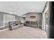 Spacious living room with sliding glass doors and stylish furnishings at 8626 White Springs Dr, New Port Richey, FL 34655