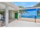 Charming pool area with a colorful mural and convenient access to the pool at 8626 White Springs Dr, New Port Richey, FL 34655