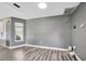 Neutral-toned room with plenty of space and natural light at 8626 White Springs Dr, New Port Richey, FL 34655