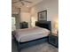 Cozy bedroom featuring a plush bed, elegant nightstands, and neutral decor for a relaxing retreat at 8630 Ne Coral Creek Loop, Hudson, FL 34667