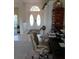 Entryway showcasing tile floors, decorative double doors, and an open layout that leads into the rest of the house at 8630 Ne Coral Creek Loop, Hudson, FL 34667