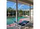 Enclosed pool area with a relaxing lounge chair, offering a private and refreshing outdoor oasis at 8630 Ne Coral Creek Loop, Hudson, FL 34667