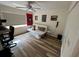 Inviting bedroom with a neutral color palette, and comfortable seating, illuminated by natural light at 9485 Hamlin Blvd # 8, Seminole, FL 33776