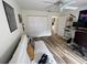 Comfortable bedroom setup with futon, and office area, offering a flexible space at 9485 Hamlin Blvd # 8, Seminole, FL 33776