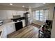 Cozy kitchen offering modern appliances and charming window views at 9485 Hamlin Blvd # 8, Seminole, FL 33776