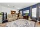 Inviting living room with comfortable seating, hardwood floors, and stylish decor at 10623 Marsha Dr, New Port Richey, FL 34655