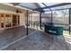The outdoor patio features comfortable seating and a stylish bar area at 11001 Peppertree Ln, Port Richey, FL 34668