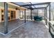 The covered patio offers a relaxing seating area and a charming bar at 11001 Peppertree Ln, Port Richey, FL 34668