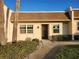Charming single-story condo with a well-manicured lawn and inviting entrance at 11130 Carriage Hill Dr # 1, Port Richey, FL 34668