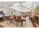 Game room with tables and chairs, ideal for gatherings and recreational activities at 11339 Alden Ct, Hudson, FL 34667