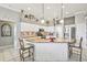 Well-appointed kitchen with an island, breakfast bar, and ample cabinet space at 11339 Alden Ct, Hudson, FL 34667