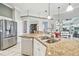 Bright kitchen with stainless steel appliances and granite countertops at 11339 Alden Ct, Hudson, FL 34667