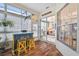 Bright and airy sunroom features a bar and plenty of natural light at 11339 Alden Ct, Hudson, FL 34667