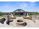 Beautiful backyard featuring a fire pit and pergola at 1155 Buckhurst Dr, Spring Hill, FL 34609