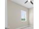Bedroom featuring carpet flooring, light walls, a window, and a ceiling fan at 1155 Buckhurst Dr, Spring Hill, FL 34609