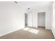 Spacious bedroom with multiple closets, offering plenty of storage space at 12450 Fish Cove Dr, Spring Hill, FL 34609