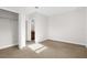 Neutral bedroom with a closet and view to the bathroom at 12450 Fish Cove Dr, Spring Hill, FL 34609