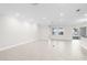 Bright and spacious living room with recessed lighting and tile flooring at 12450 Fish Cove Dr, Spring Hill, FL 34609