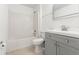 Clean bathroom features a shower-tub combination and a modern vanity with updated fixtures at 1313 Gatewood Ave, Spring Hill, FL 34608