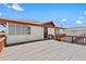 Exterior angle of home with a very large patio deck at 13820 Plumosa Ave, Hudson, FL 34667