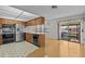 Eat-in kitchen with modern appliances and views of the water at 13820 Plumosa Ave, Hudson, FL 34667