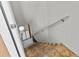 Carpeted stairway with white handrail leading up at 13820 Plumosa Ave, Hudson, FL 34667