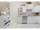 Bright kitchen features stainless steel appliances and plenty of cabinet space at 14471 Sterling Run, Spring Hill, FL 34609
