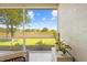 Screened-in lanai features a beautiful green view and plenty of natural light at 14471 Sterling Run, Spring Hill, FL 34609